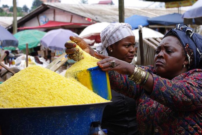 Garri seller in the market (image used for illustrative purpose) [Business Elites Africa]