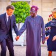 President Bola Tinubu shares laugh with French President [Presidency]