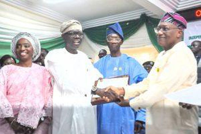 Gov. Babajide Sanwo-Olu (Second from Left) receiving Certificate of Return from INEC National Commissioner, Mr Sam Olumekun (Fourth from Left) on Thursday in Lagos.