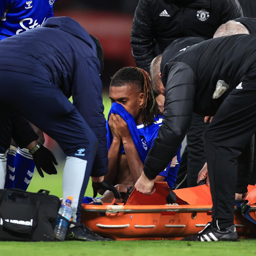 Alex Iwobi was stretchered off injured and in tears at Old Trafford