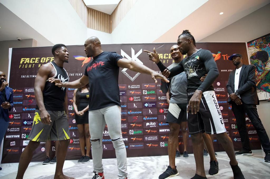 Segun Ogunoiki (L) challenges Drame during the weigh-in on Wednesday.