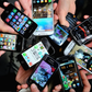 Mixed reactions trail appropriate age to allow children use phones.