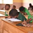 Visually impaired student learning in class room with other students [CBM]