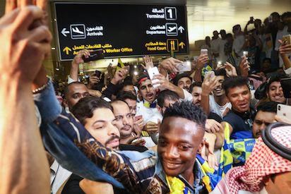 Ahmed Musa was swarmed upon arrival in Saudi Arabia by Al-Nassr fans