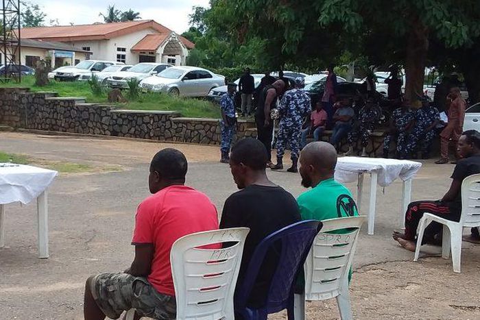 The Police Public Relations Officer in Oyo State, SP Osifeso, parading 10 suspected armed robbers and car snatchers at the command’s headquarters, Eleyele, Ibadan on Friday. [NAN]