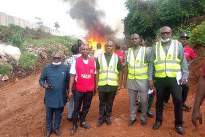 NAFDAC officials at the destruction of fake products from Southeast, South South in Awka. [NAN]