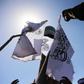 Taliban fighters stand next to Taliban flag on August 31, 2022.Bilal Guler/Anadolu Agency via Getty Images