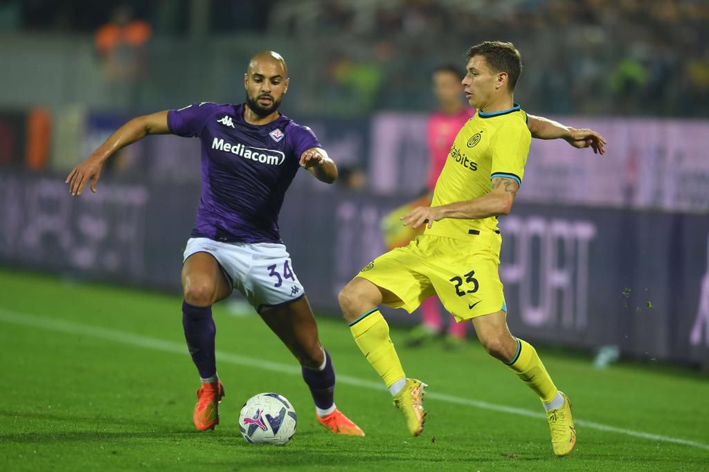 Nicolo Barella (Inter)Sofyan Amrabat (Fiorentina) during the Italian Serie A match between match between Fiorentina 3-4 Inter at Artemio Franchi Stadium on October 22 , 2022 in Florence, Italy.