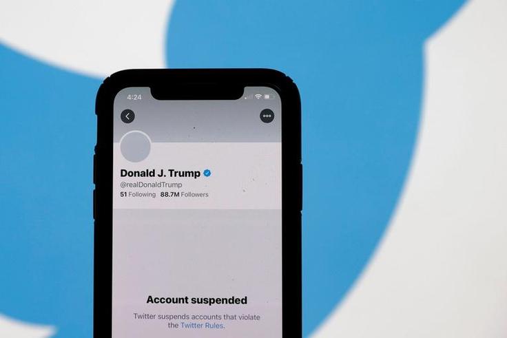 The suspended Twitter account of U.S. President Donald Trump appears on an iPhone screen on January 08, 2021 in San Anselmo, California. Citing the risk of further incitement of violence following an attempted insurrection on Wednesday, Twitter permane...