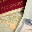 A vintage US map, passport and visa.belterz/Getty Images