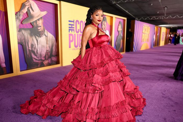 Halle Bailey, who plays a younger version of Ciara's character, opted for a voluminous tiered red dress for the occasion.