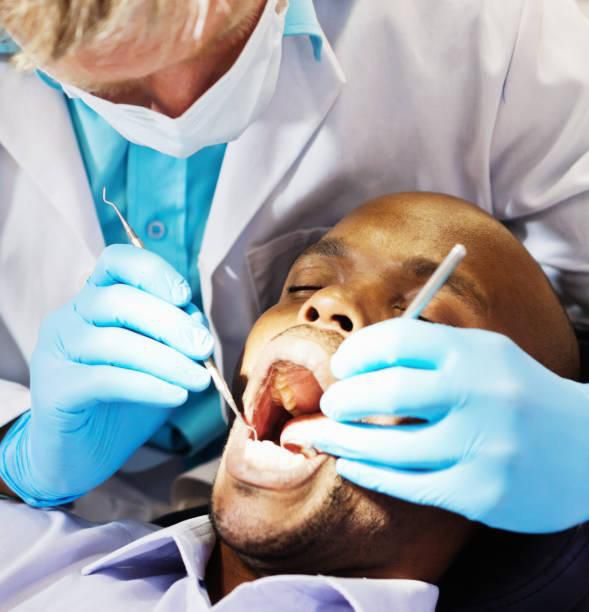 A patient being examined by a dentist
