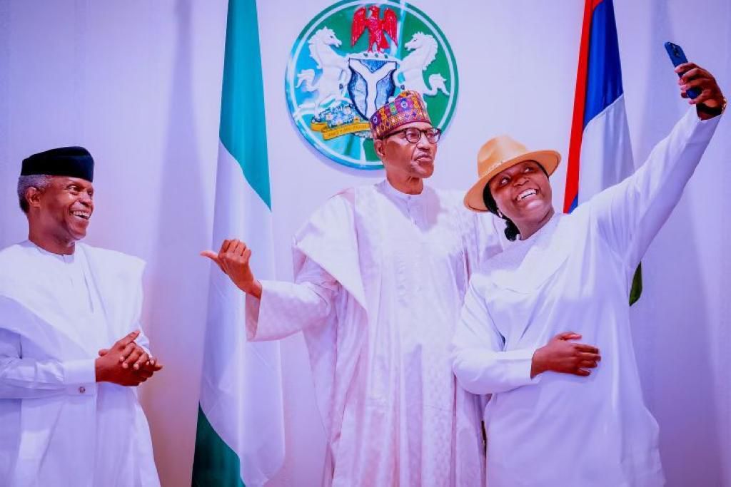 Yemi Osinbajo (left), Muhammadu Buhari (middle), Alli (right)
