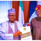 President Bola Tinubu and NPC Chairman, Nasir Kwarra. [Presidency]