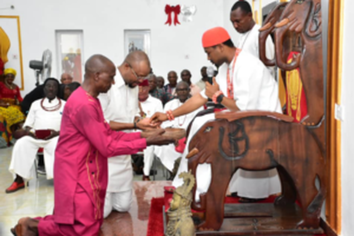 Majority Leader of Delta House of Assembly, Mr Emeka Nwaobi (second left), receiving royal blessings from Obi Nduka Ezeagwuna, the traditional ruler of Issele-Uku Kingdom in Aniocha North Local Government Area of Delta, on Thursday.