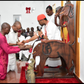 Majority Leader of Delta House of Assembly, Mr Emeka Nwaobi (second left), receiving royal blessings from Obi Nduka Ezeagwuna, the traditional ruler of Issele-Uku Kingdom in Aniocha North Local Government Area of Delta, on Thursday.