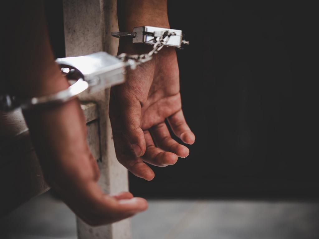 A man in handcuffs.Atit Phetmuangtong / EyeEm/Getty Images