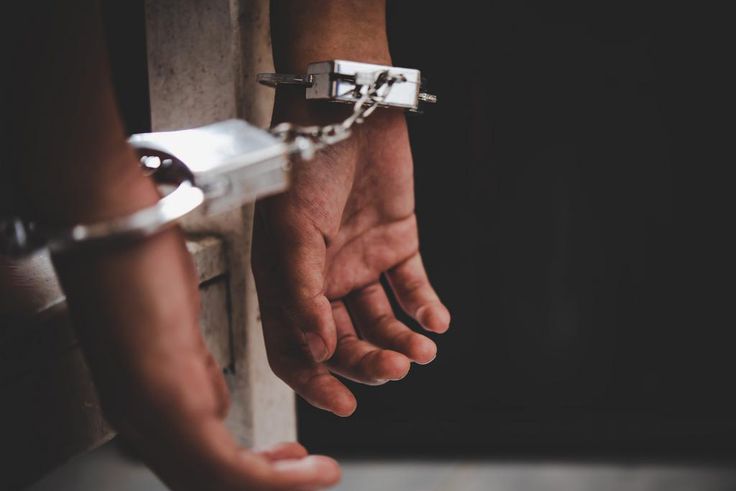 A man in handcuffs.Atit Phetmuangtong / EyeEm/Getty Images