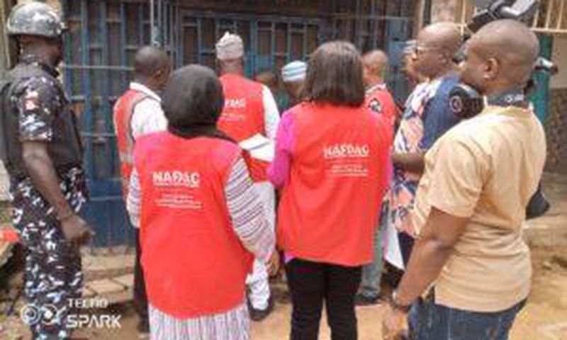 NAFDAC officials sealing a shop with unwholesome products in Suleja, Niger State.