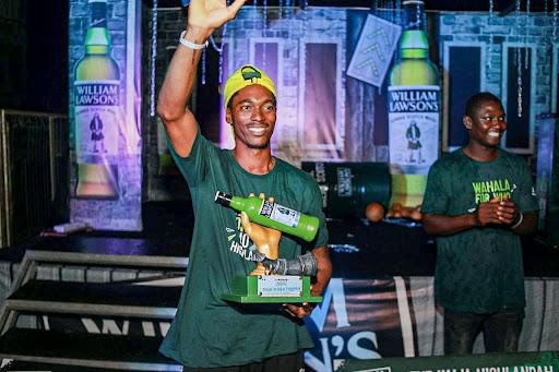 Winner, The Naija Highlandah Challenge 2022, Akinwale Awatt displaying his trophy at the Grand Finale of The NaijaHighlandah Challenge by William Lawson's held at Union Bank Sports Ground, Surulere, Lagos on Saturday November 12.