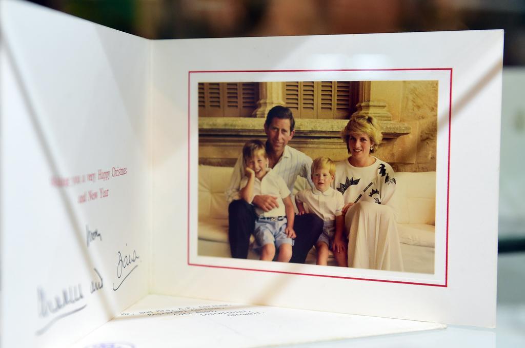 1987: Three years later, Diana and Charles shared another family portrait.