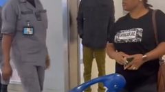 Nigerians condemn woman for tearing husband's passport at Lagos airport