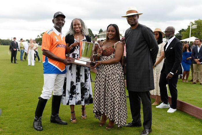 Sayyu Dantata, Chairman, MRS; Ofovwe Aig-Imoukhuede; Tochi Wigwe, daughter of Herbert Wigwe, the late GCEO of Access Holdings PLC; Aigboje Aig-Imoukhuede, Chairman, Access Holdings PLC, at the Access Bank Polo Tournament, held at the Guards Polo Club i...
