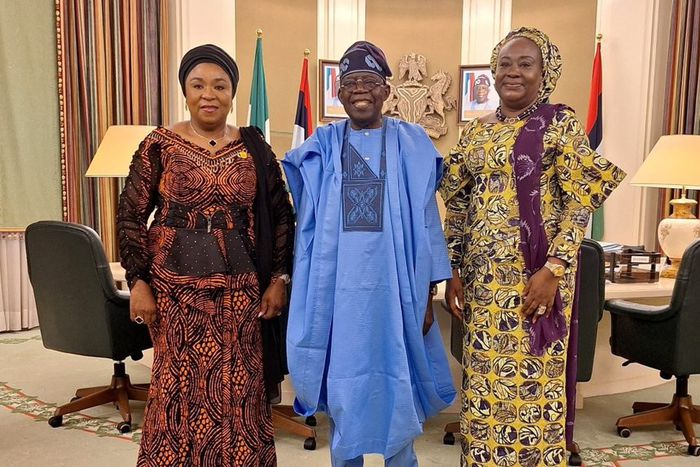 President Bola Tinubu flanked by Mrs Folashade Esan, outgoing Head of Service of the Federation (R), and her successor, Mrs Esther Wilson-Jack (L) [Presidency]