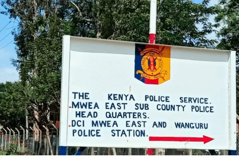 Sign post showing Wanguru Police Station