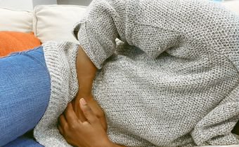 Abdominal pain is a common symptom of colon cancer.Getty Images