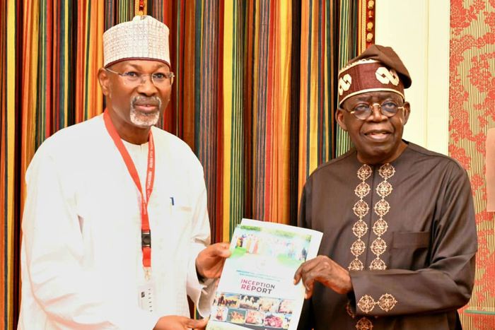 Prof. Attahiru Jega, Chairman, Presidential Committee on Implementation of Livestock Reforms, presenting the committee’s report to President Bola Tinubu at the Presidential Villa on Thursday
