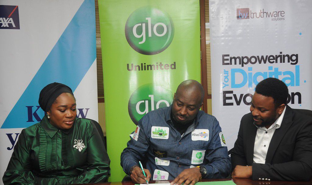 Chief Marketing Officer, AXA Mansard, Surakat Adebola; Head, Value Added Services, Globacom, Mojeed Aluko; and Managing Partner, Truthware Solutions, Samuel Ishie, at the launch of a Health Insurance scheme for Glo subscribers in Lagos on Tuesday