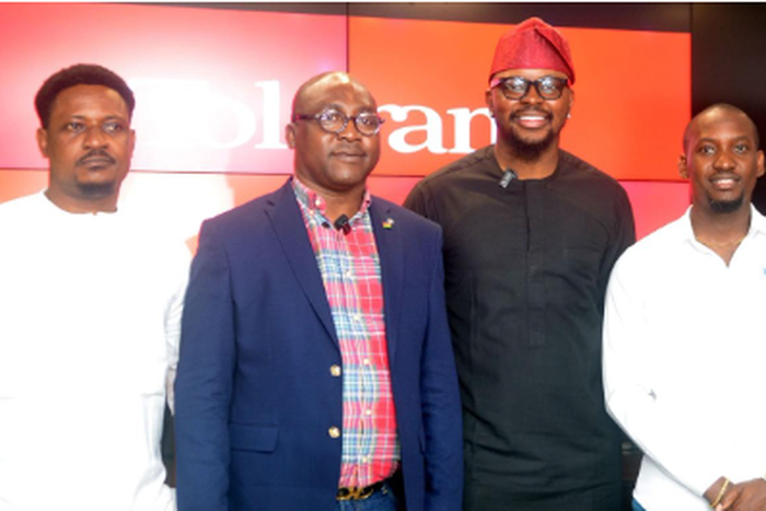 L-R: Co-Project Lead, Fola David Team, Timisire Abayomi; Group Corporate Communication and Events General Manager, Tolaram; Temitope Ashiwaju; new Guinness World Record holder for the world's largest painting by an individual, Dr. Fola David, and Proje...