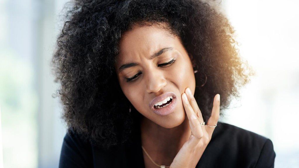 Tooth pain or sensitivity is a sign that something might be wrong [Healthgrades]