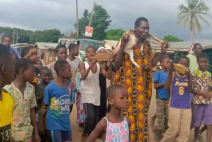55-year-old man paraded amid singing and booing while carrying allegedly stolen goat