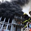Men of the Lagos State Fire and Rescue Service where right on time to contain the fire outbreak at the scene of the incident on Lagos Island. [Getty Images]