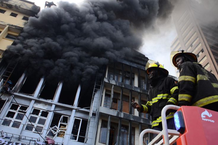 Men of the Lagos State Fire and Rescue Service where right on time to contain the fire outbreak at the scene of the incident on Lagos Island. [Getty Images]