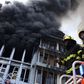 Men of the Lagos State Fire and Rescue Service where right on time to contain the fire outbreak at the scene of the incident on Lagos Island. [Getty Images]