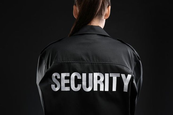 Female security guard [Adobe Stock]