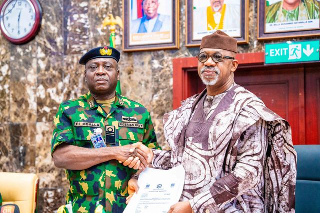 Ogun State Governor, Dapo Abiodun presentING land document to the Chief of Naval Staff (CNS), Vice Adm. Emmanuel Ogalla [X:@DapoAbiodunCON]