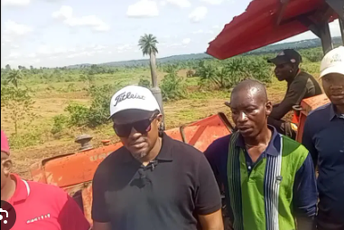 Cross River’s Commissioner for Agriculture, Johnson Ebokpo and other state officials inspecting ongoing land preparation for the cultivation of maize in Odukpani LGA