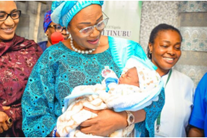 Nigeria's First Lady, Remi Tinubu welcoming a newborn at the National Hospital, Abuja. [TheCable]