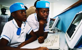 Some Nigerian secondary school students working on a computer. [Getty Images]