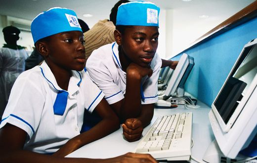 Some Nigerian secondary school students working on a computer. [Getty Images]