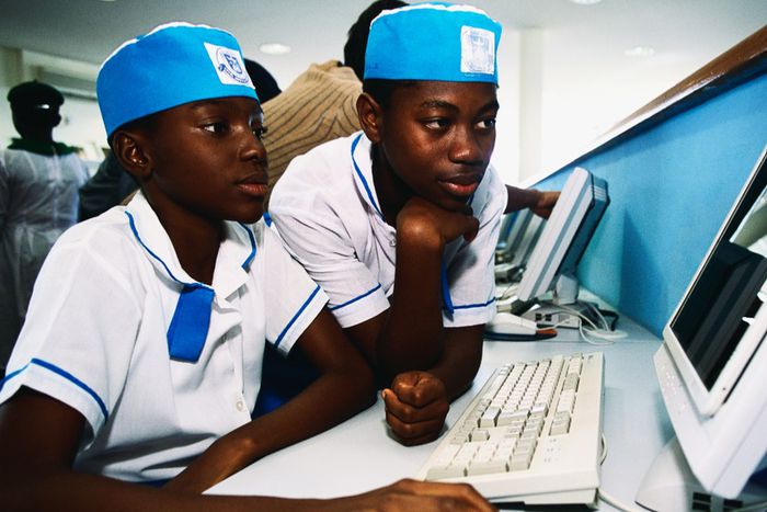 Some Nigerian secondary school students working on a computer. [Getty Images]