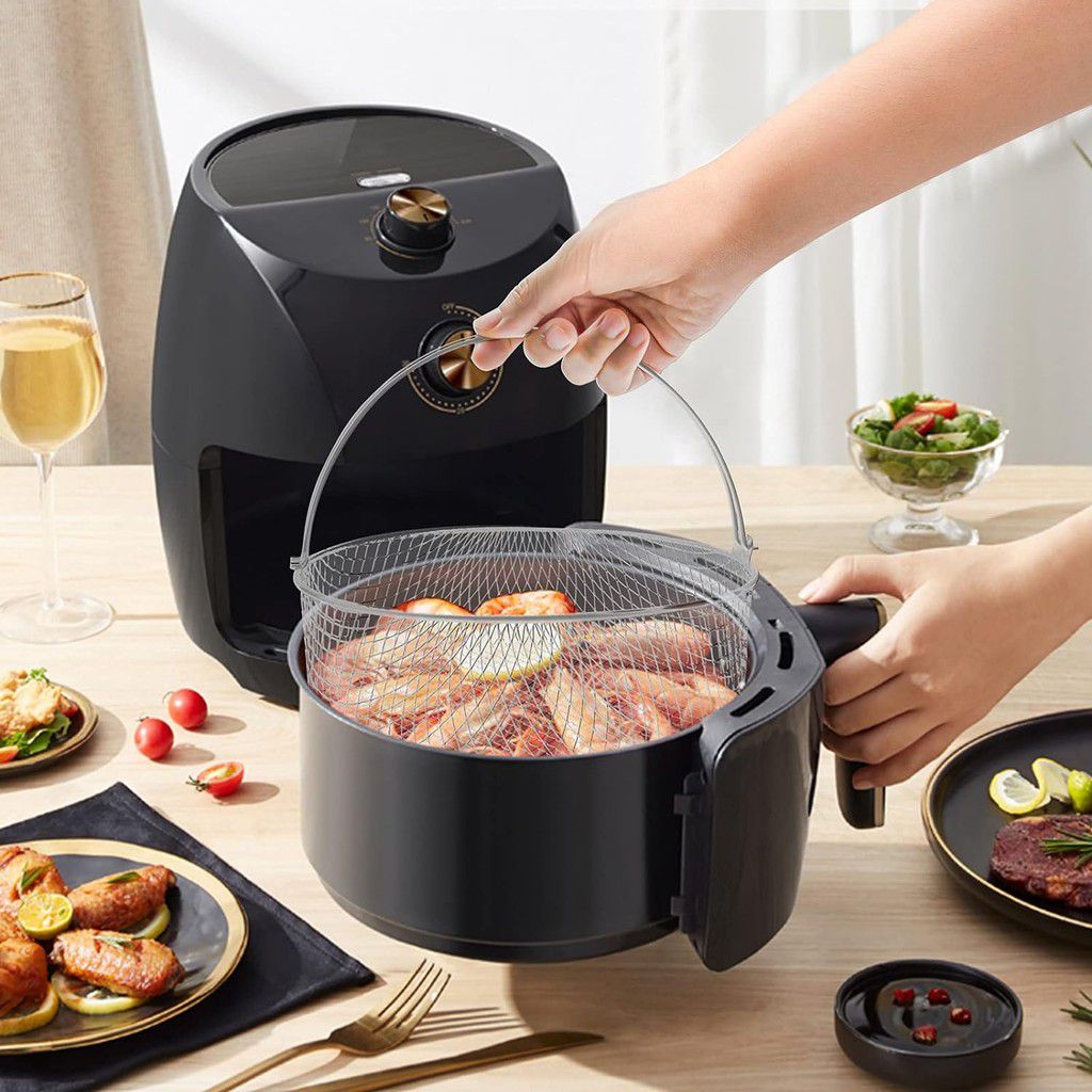 Arrange food in the air fryer basket [UbuyNigeria]