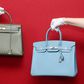 A Hermes Birkin (right) and a Herms Kelly (left) in a pre-auction photo.rune hellestad/Corbis via Getty Images