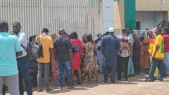 Nigerians waiting at National Agricultural Insurance Corporation at the Central Area in Abuja to buy government subsidised bags of rice [NAN]
