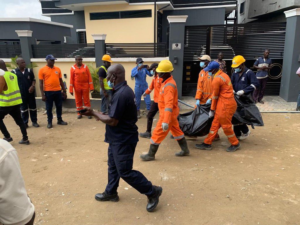 One of the victims' body being moved to into an ambulance.