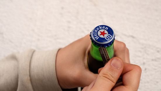 Opening a bottle with a key
